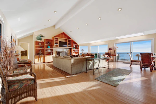 Oceanfront home with private hot tub, views, & close beach access