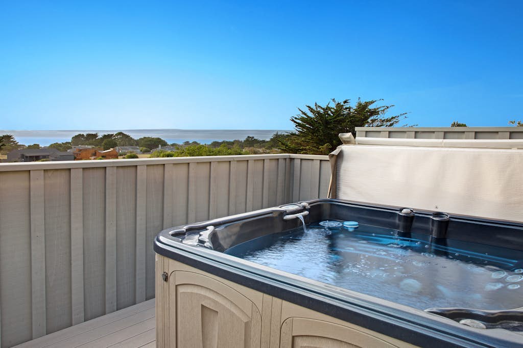Eternal Equinox - Ocean view home with fireplace, deck, private hot tub & grill