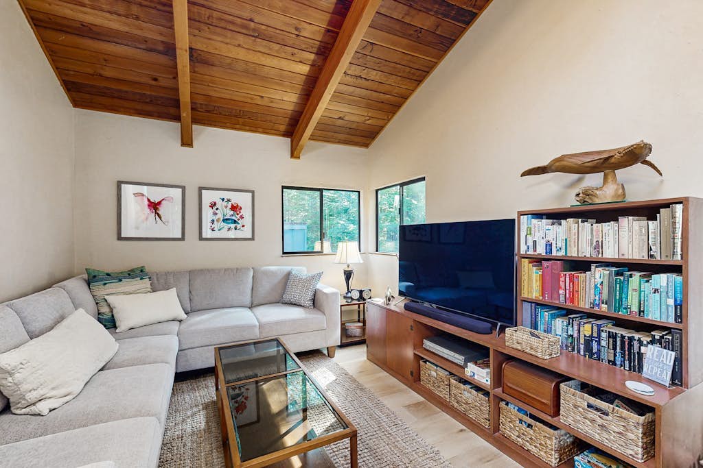 This Sea Ranch home frames the Pacific like a painting -- and the view changes by the hour. Soak in the hot tub as the sun dips below the Trees. Curl up by the fireplace as fog rolls in off the Pacific. Room for 6 in this 3-bedroom home. Just a 8-minute walk to Black Point trails. The Sonoma Coast's best-kept secret is waiting for you. The bluff trail starts steps from the door, winding along the cliffs above crashing whitecaps.