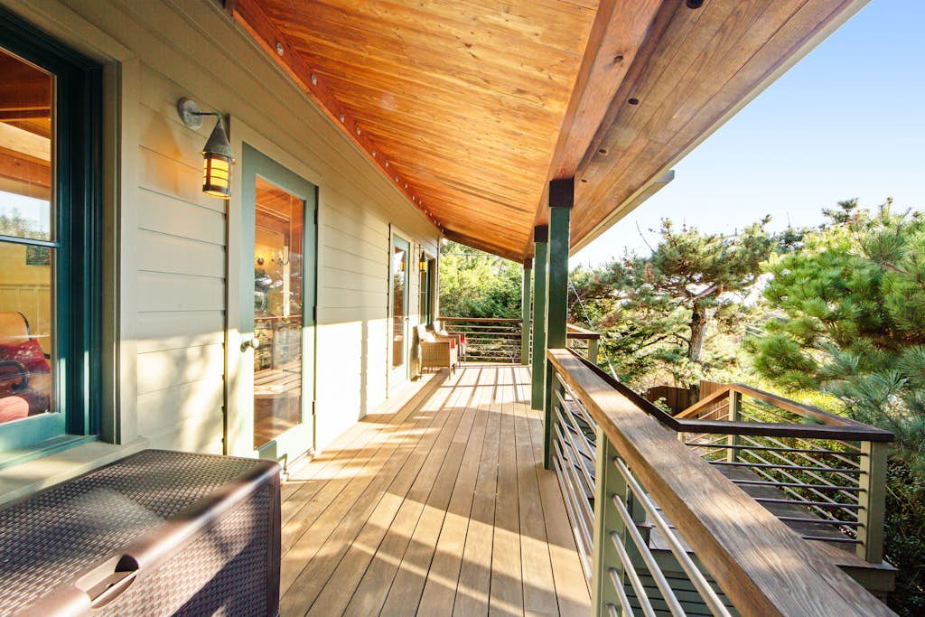 Unique coastal retreat boasting ocean views, spacious deck, lofted layout & WiFi