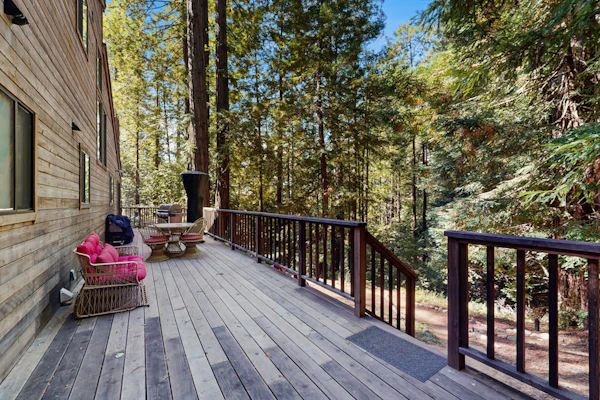 Secluded, two-story getaway with free WiFi, wood stove, & furnished deck