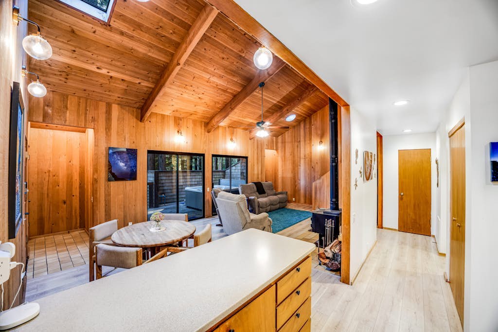 Forested home with hot tub, deck, gas grill & wood-burning stove