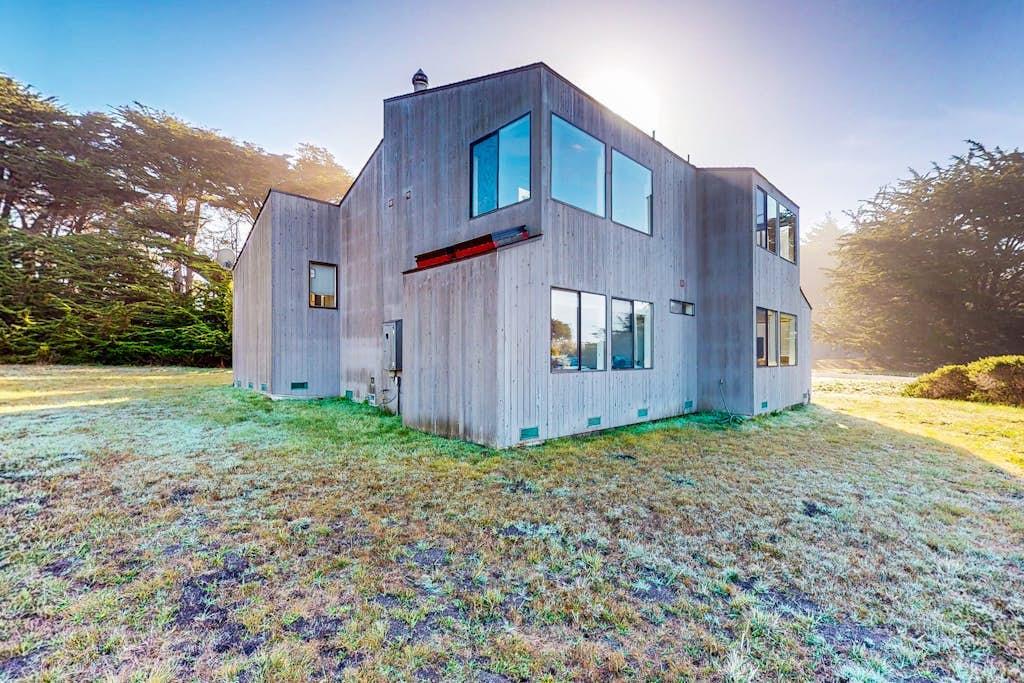 Start the day with meadow views and end it with a sunset that turns the sky electric. Bring your pup -- dogs love the bluff trails here. A warm fire and meadow views anchor cozy evenings in. Room for 6 in this 3-bedroom home. Sea Ranch community pools, tennis courts, and the Lodge are nearby. Whale watching, sunset hikes, and starlit skies -- the coast is calling. Watch the fog roll in from the deck as the coastline disappears and reappears like magic.