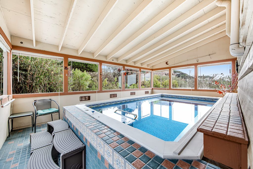Dog-friendly beach house with private hot tub, indoor pool, WiFi & ocean views
