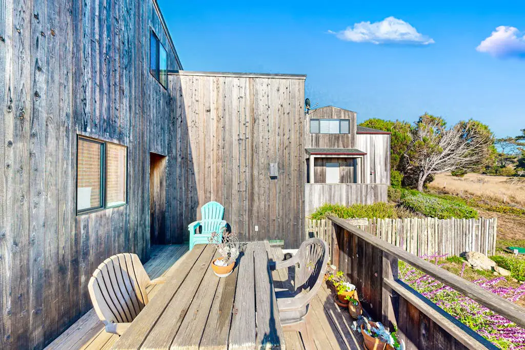 Clemons' Cottage - Ocean-view meadow home with deck & grill near Black Point, dogs welcome