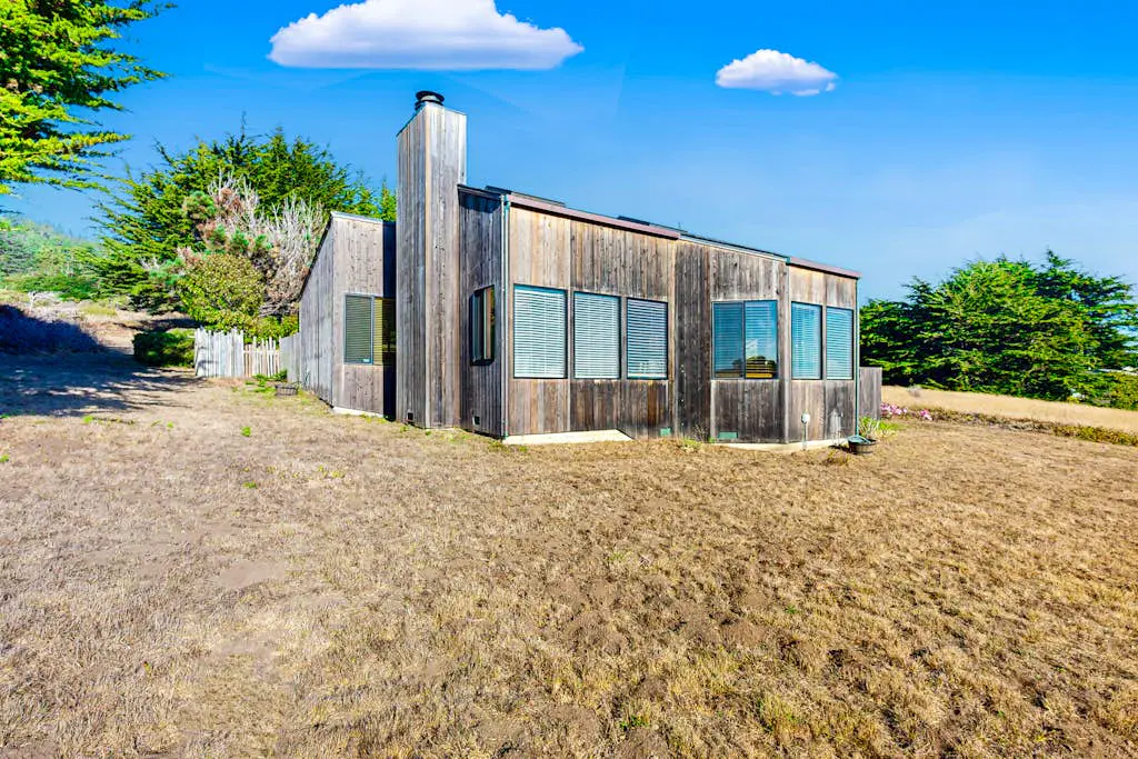 Clemons' Cottage - Ocean-view meadow home with deck & grill near Black Point, dogs welcome