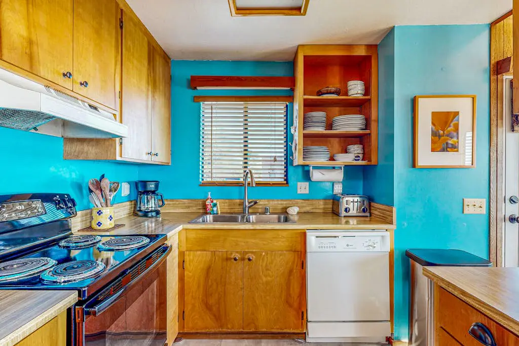 Clemons' Cottage - Ocean-view meadow home with deck & grill near Black Point, dogs welcome