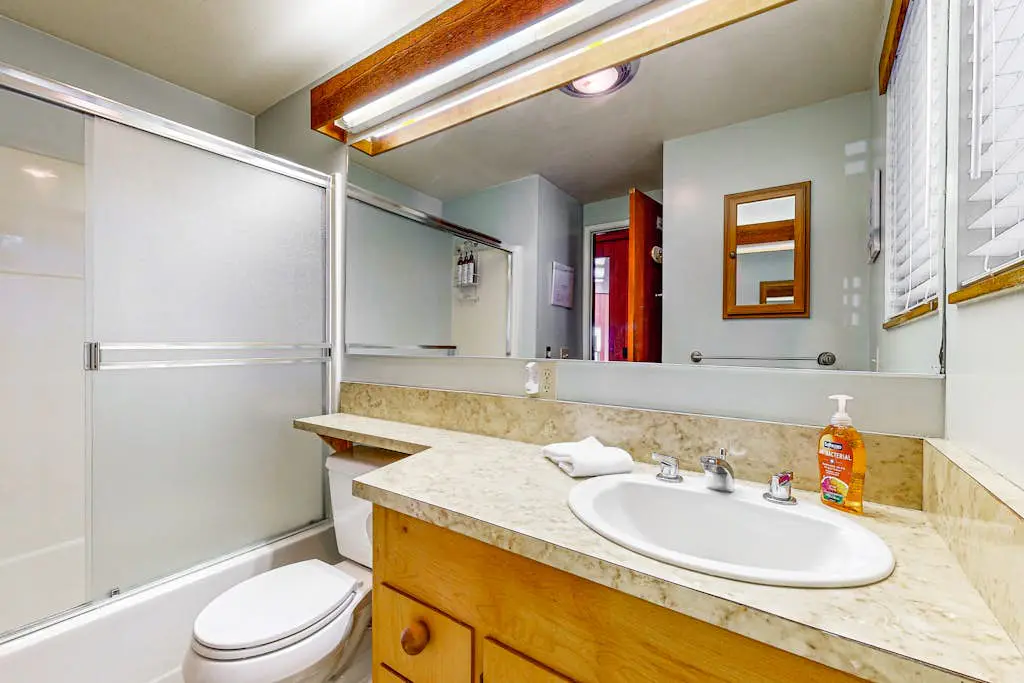Clemons' Cottage - Ocean-view meadow home with deck & grill near Black Point, dogs welcome