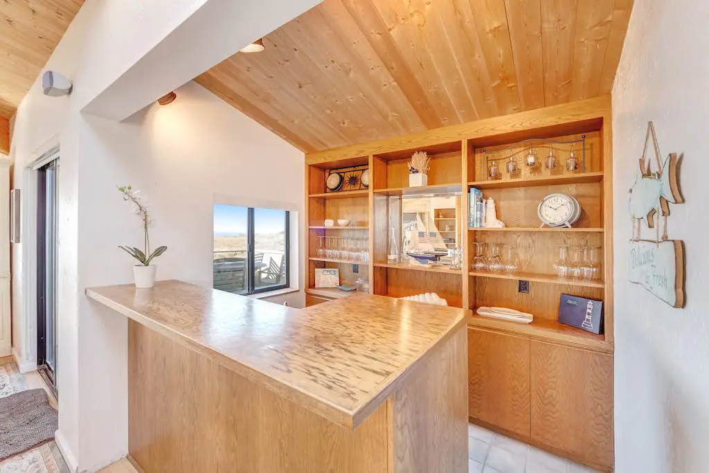Dog-friendly home with cove views, a private hot tub, & rec center access