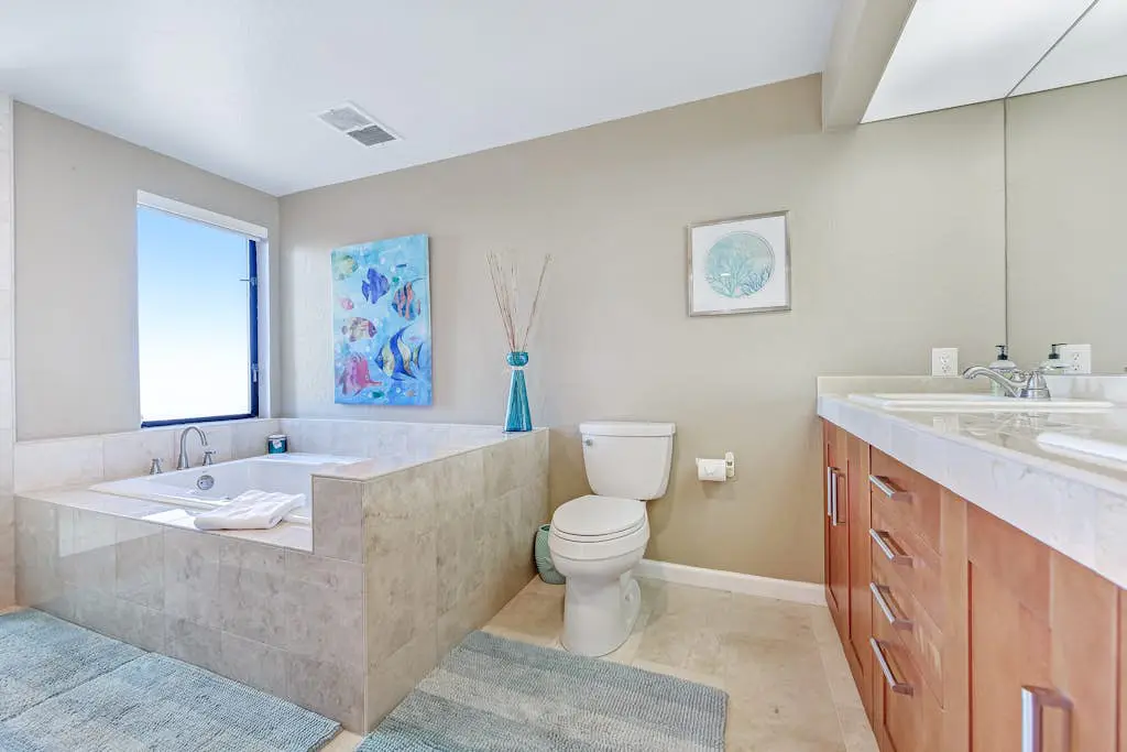 Dog-friendly home with cove views, a private hot tub, & rec center access