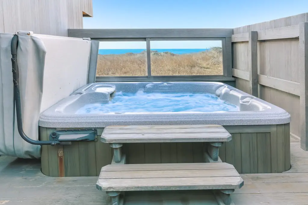 Dog-friendly home with cove views, a private hot tub, & rec center access