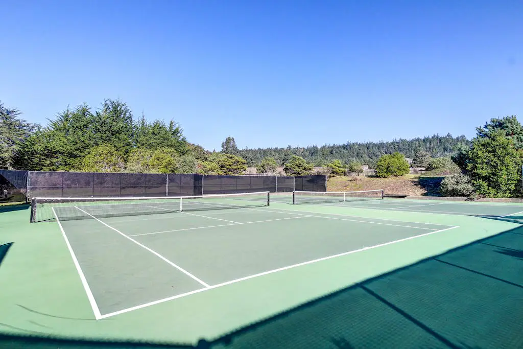 Dog-friendly home with cove views, a private hot tub, & rec center access