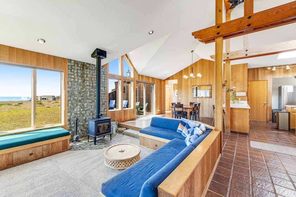 Panoramic ocean views greet you from the moment you walk through the door. Your deck is a front-row seat to the Pacific. Room for 6 in this 3-bedroom home. Just a 12-minute walk to the heated community pool. Trails, tidepools, and two heated community pools -- all within reach. The rhythm of the waves sets the pace here -- unhurried mornings, lingering sunsets, deep sleep. Winter storms put on a show from the safety of the living room -- nature's own theater.