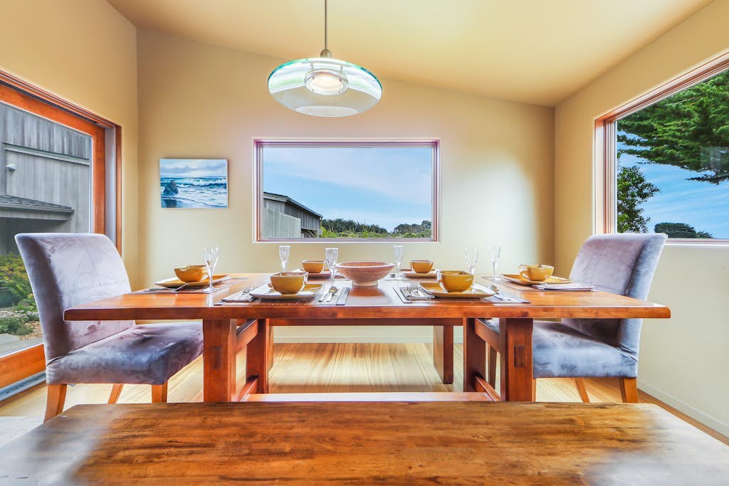 Where the forest opens to coastal meadows and the shimmer of the Pacific beyond. Soak in the hot tub with views of the hills and golf course as the sun dips below the Pacific. Curl up by the fireplace as fog rolls in off the Pacific. Room for 6 in this 3-bedroom home. Near the heated community pool. The Sonoma Coast's best-kept secret is waiting for you. The light here shifts by the hour -- silver mornings, gold afternoons, pink-and-orange sunsets. Morning fog and afternoon sun create a rhythm you'll settle into by day two.