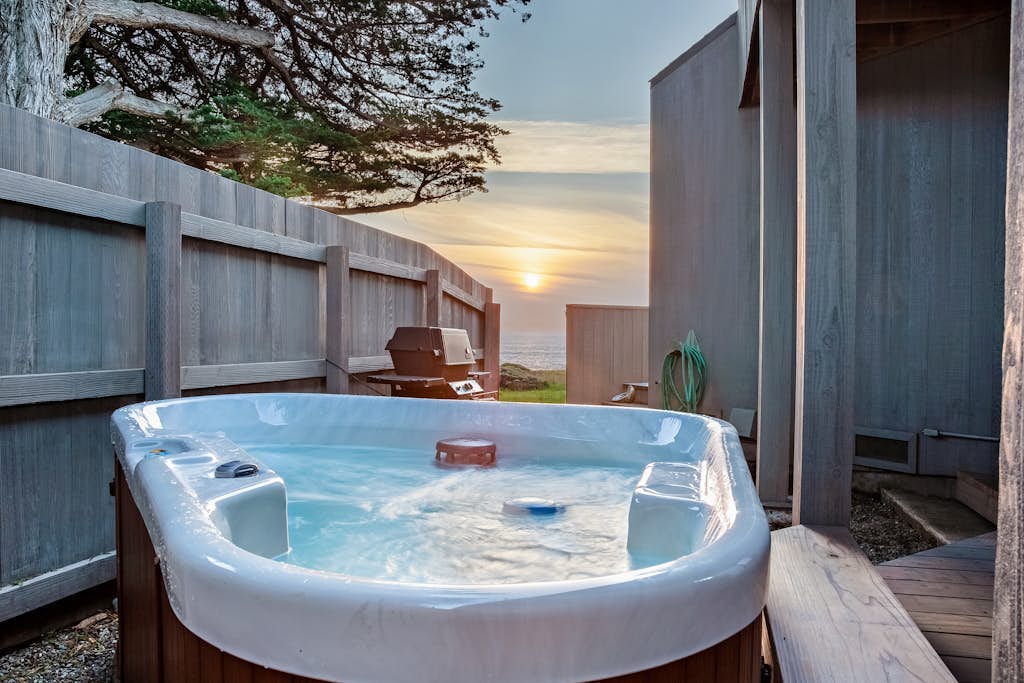 Fall asleep to the rhythm of the Pacific from this oceanfront retreat on the Sonoma Coast. Soak in the hot tub as the sun dips below the Pacific. Step outside to a deck overlooking the ocean. Room for 6 in this 3-bedroom home. A short walk from Pebble Beach. Trails, tidepools, and two heated community pools -- all within reach. Watch the fog roll in from the deck as the coastline disappears and reappears like magic.