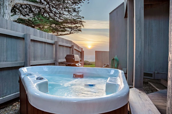 Fall asleep to the rhythm of the Pacific from this oceanfront retreat on the Sonoma Coast. Soak in the hot tub as the sun dips below the Pacific. Step outside to a deck overlooking the ocean. Room for 6 in this 3-bedroom home. A short walk from Pebble Beach. Trails, tidepools, and two heated community pools -- all within reach. Watch the fog roll in from the deck as the coastline disappears and reappears like magic.