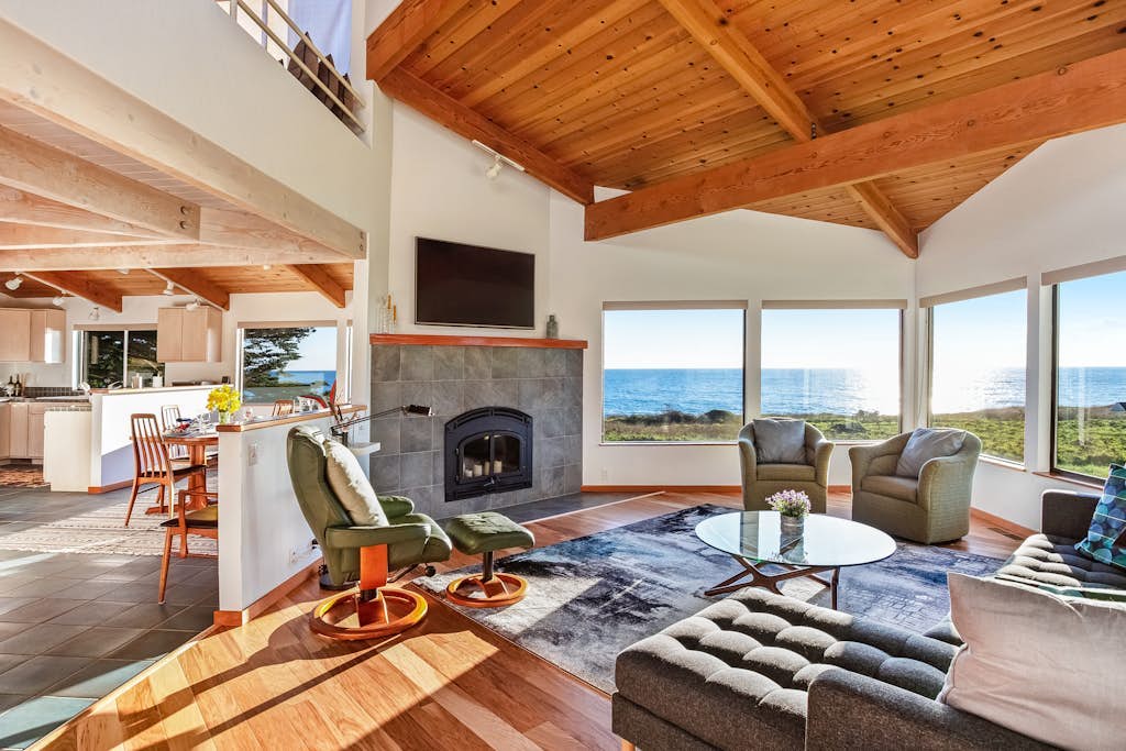 Fall asleep to the rhythm of the Pacific from this oceanfront retreat on the Sonoma Coast. Soak in the hot tub as the sun dips below the Pacific. Step outside to a deck overlooking the ocean. Room for 6 in this 3-bedroom home. A short walk from Pebble Beach. Trails, tidepools, and two heated community pools -- all within reach. Watch the fog roll in from the deck as the coastline disappears and reappears like magic.