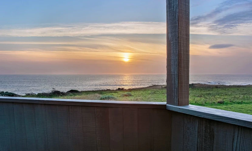Fall asleep to the rhythm of the Pacific from this oceanfront retreat on the Sonoma Coast. Soak in the hot tub as the sun dips below the Pacific. Step outside to a deck overlooking the ocean. Room for 6 in this 3-bedroom home. A short walk from Pebble Beach. Trails, tidepools, and two heated community pools -- all within reach. Watch the fog roll in from the deck as the coastline disappears and reappears like magic.