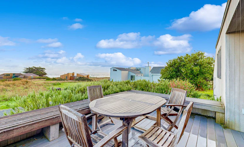 Oceanview bluff home with private hot tub, shared pool, saunas, tennis, & EVC