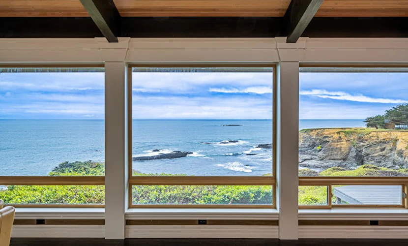 Luxury blufftop home with hot tub, wraparound deck, gourmet kitchen & ocean view