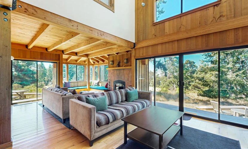 Pull up a chair on the deck and watch the fog roll in over miles of open ocean. End the day in your private hot tub with the ocean as your soundtrack. Curl up by the fireplace as fog rolls in off the Pacific. Room for 7 in this 4-bedroom home. Near the heated community pool. The Sonoma Coast's best-kept secret is waiting for you. The ocean soundtrack never stops here -- waves at dawn, crashing surf at dusk. Morning fog and afternoon sun create a rhythm you'll settle into by day two.
