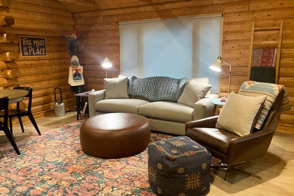 Forest cabin with large deck in private setting - close to beaches and town 