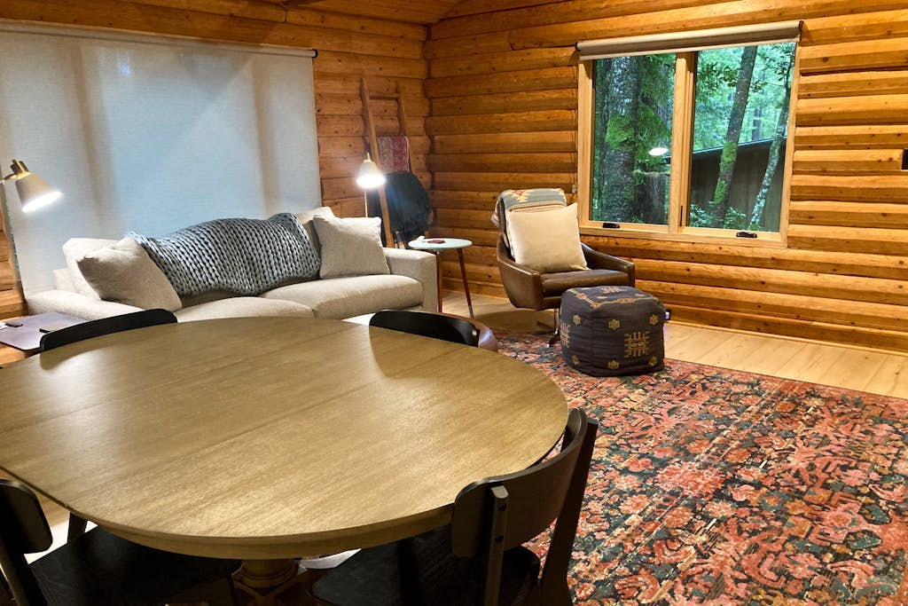 Forest cabin with large deck in private setting - close to beaches and town 