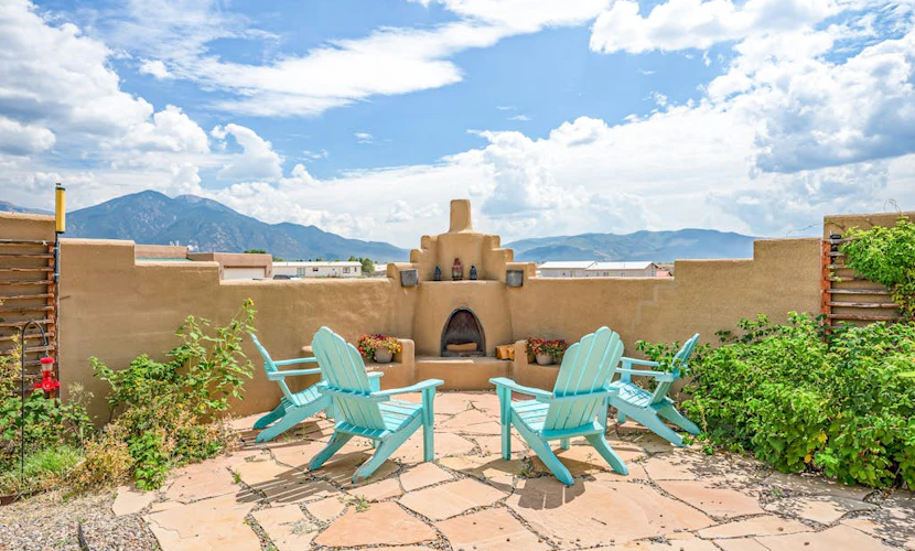 Enchanting dog-friendly home with firepit, patio, gas grill, & jetted tub