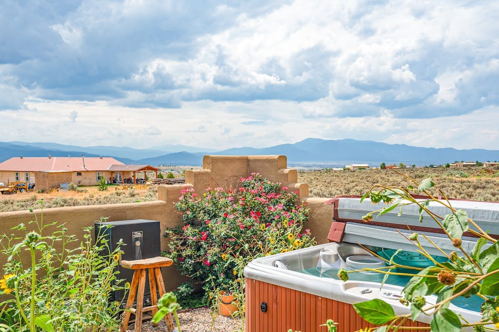 Enchanting dog-friendly home with firepit, patio, gas grill, & jetted tub