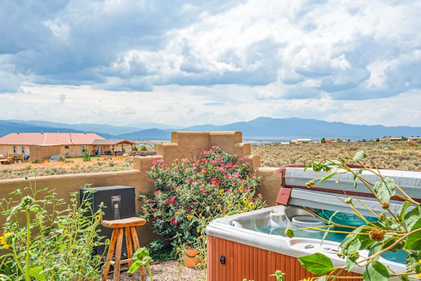 Enchanting dog-friendly home with firepit, patio, gas grill, & jetted tub