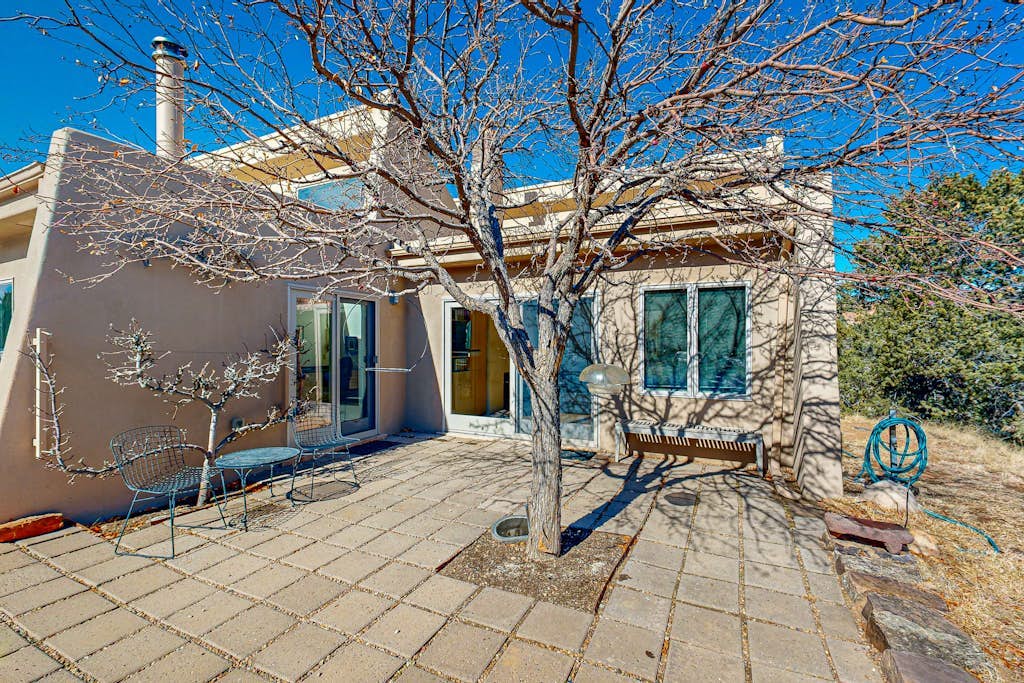 Peaceful retreat with tons of privacy, patio, gas fireplace & wood burning stove