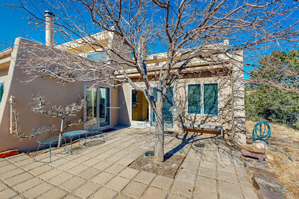 Peaceful retreat with tons of privacy, patio, gas fireplace & wood burning stove