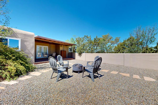 Privacy and stunning views await at this spacious Santa Fe retreat near plaza