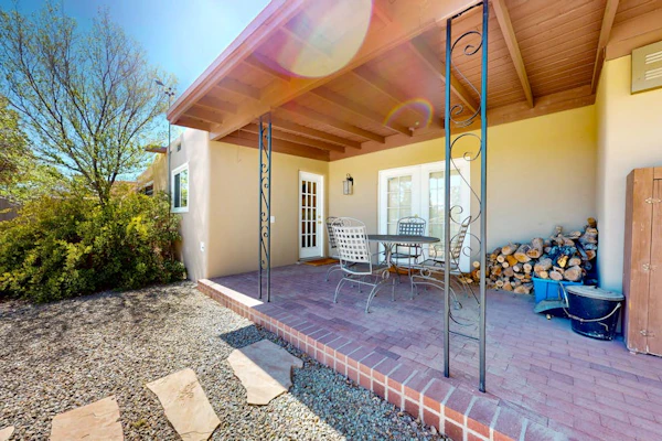 Privacy and stunning views await at this spacious Santa Fe retreat near plaza