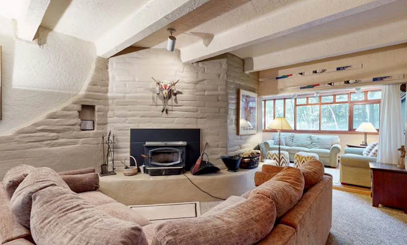 Designer Forest-View Condo with Balcony, Wood Stove & Sunroom - Near Slopes