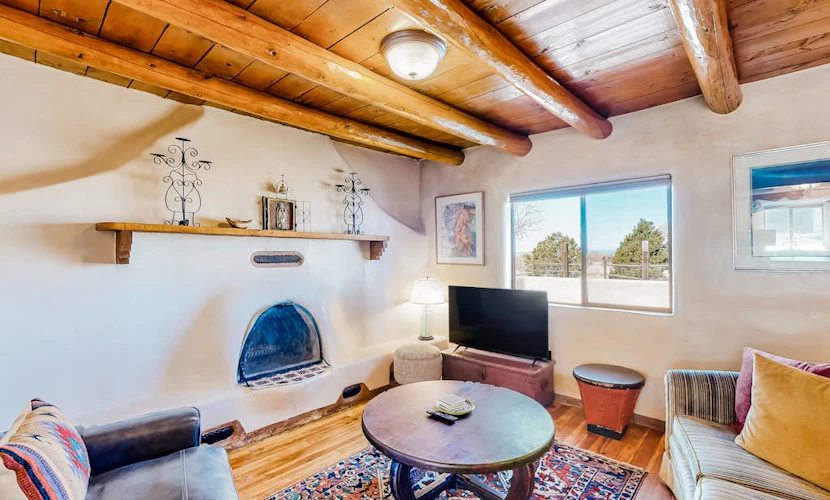 Restored 1938 adobe with mountain view & kiva fireplace - dog-friendly