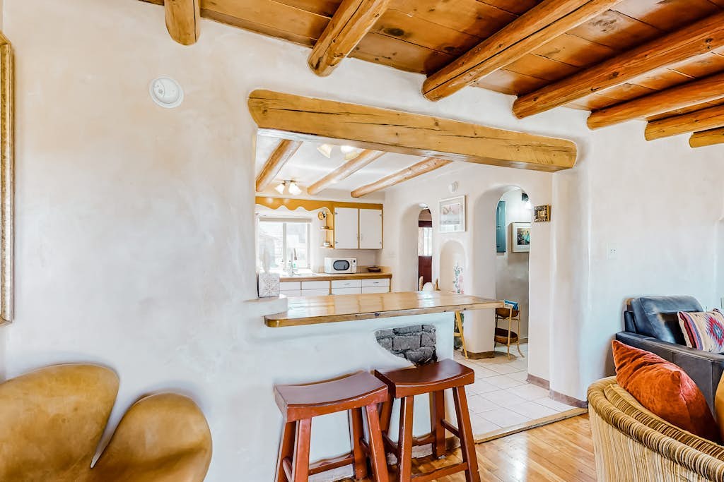 Restored 1938 adobe with mountain view & kiva fireplace - dog-friendly