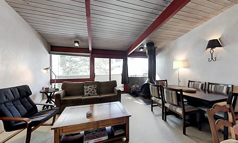 Ski-in/out delight with woodstove & balcony- walk to shops, dining & skating