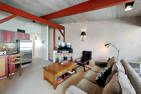 Ski-in/out delight with woodstove & balcony- walk to shops, dining & skating