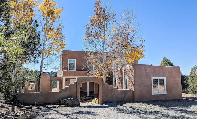Dog-friendly home on 11 acres overlooking nt'l forest with fireplaces & patio