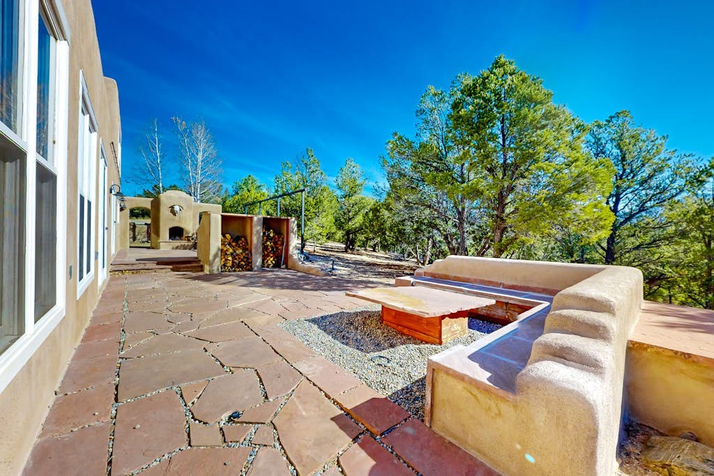 Dog-friendly home on 11 acres overlooking nt'l forest with fireplaces & patio