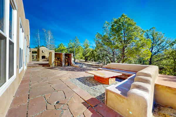 Dog-friendly home on 11 acres overlooking nt'l forest with fireplaces & patio