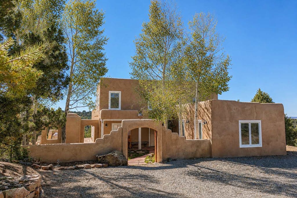 Dog-friendly home on 11 acres overlooking nt'l forest with fireplaces & patio