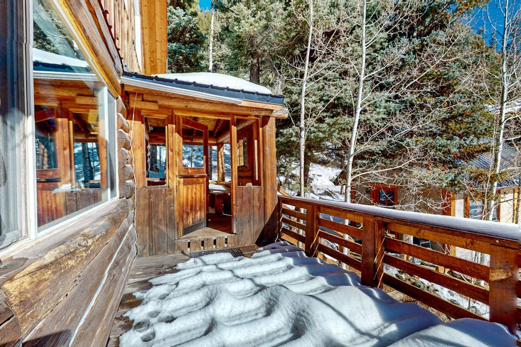 Serene & sunlit dog-friendly cabin with hot tub, fire pit, & views - near skiing