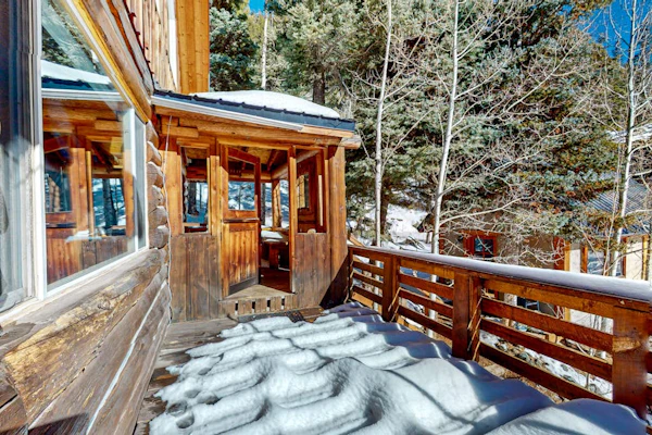 Serene & sunlit dog-friendly cabin with hot tub, fire pit, & views - near skiing
