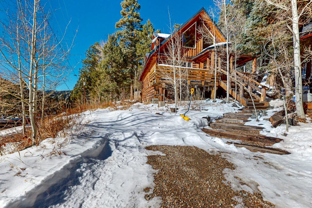 Serene & sunlit dog-friendly cabin with hot tub, fire pit, & views - near skiing