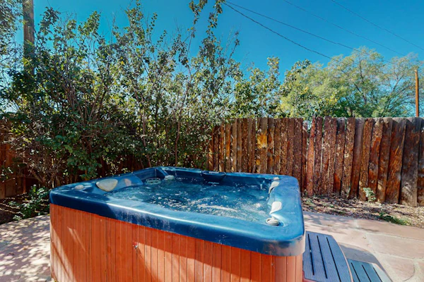 Classic Adobe with hot tub, covered patio & pond near town