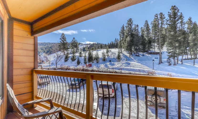 Condo with mountain views, cozy wood burning fireplace, & private gas grill