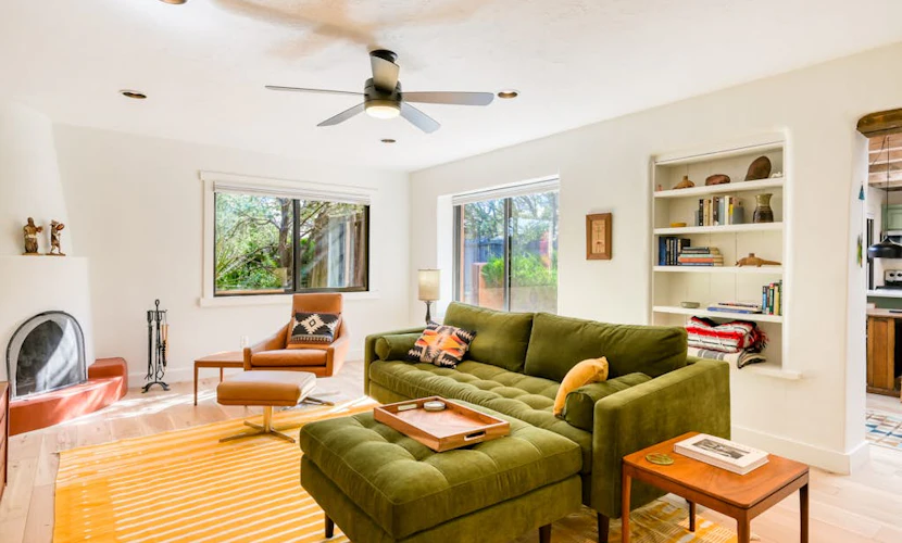 Fully renovated duplex in ideal location with private courtyard & kiva fireplace