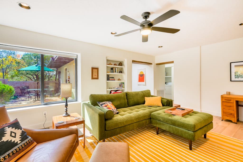 Fully renovated duplex in ideal location with private courtyard & kiva fireplace